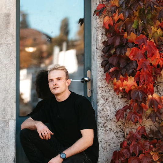 Male model wearing the Amsterdam Jeans by Short Supply, designed for shorter men